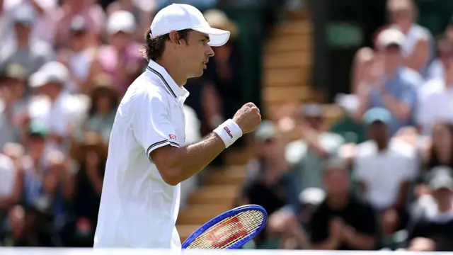 Alex De Minaur celebrates