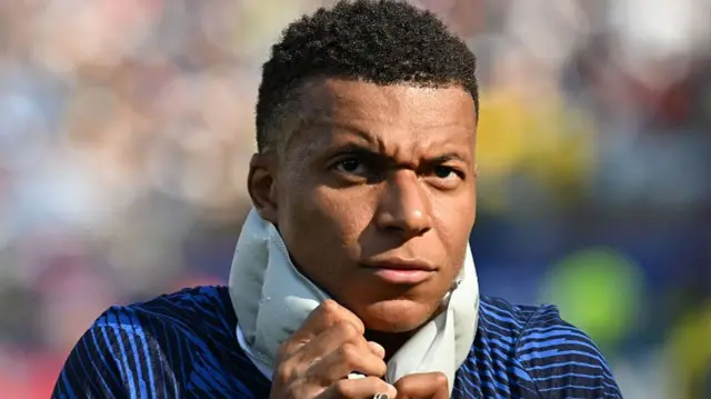 Kylian Mbappe #10 of France cools off during a hydration break in the FIFA World Cup 2026 Round Of 32 match between France and Sweden.