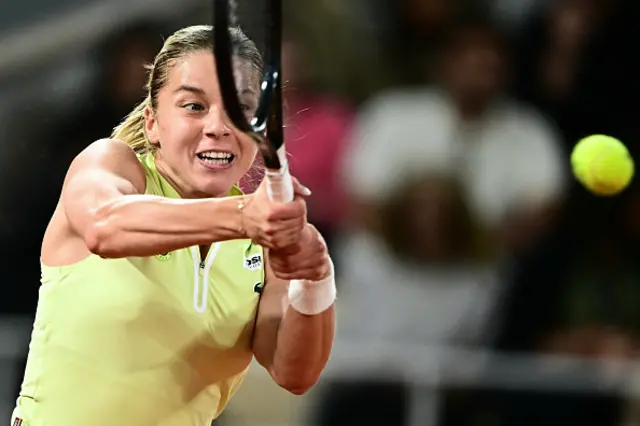 Poland's Maja Chwalinska plays a backhand return
