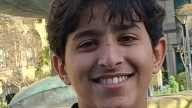 Close-up of a young boy smiling