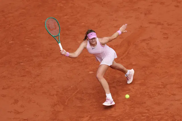 Mirra Andreeva plays a forehand