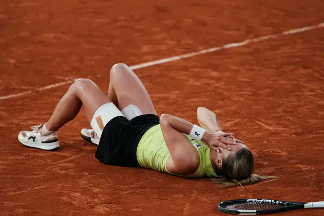 Maja Chwalinska of Poland celebrates winning match point