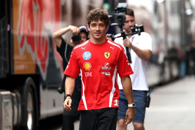 Charles Leclerc arrives in the paddock