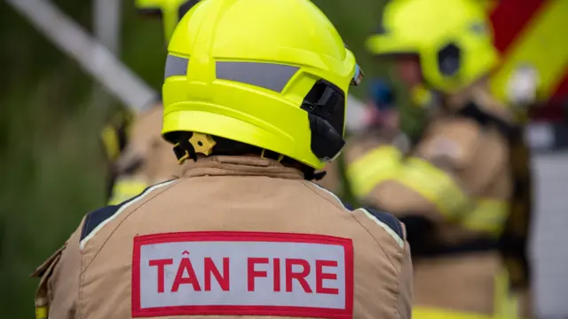 A fireman wearing his protective gear