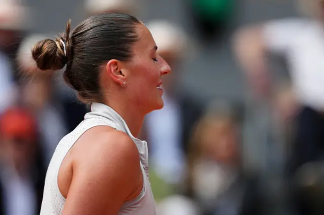 Ukraine's Marta Kostyuk reacts