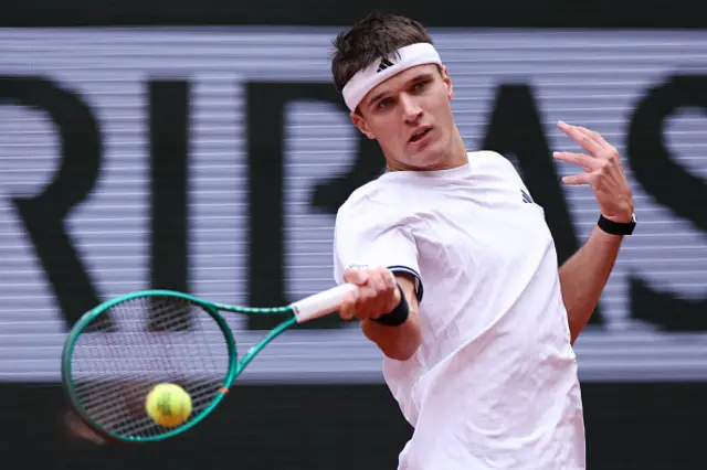 Czech Republic's Jakub Mensik plays a forehand