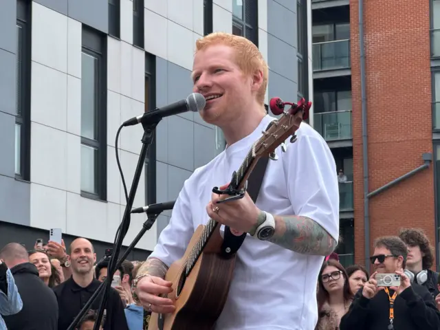 Ed wearing t-shirt and jeans