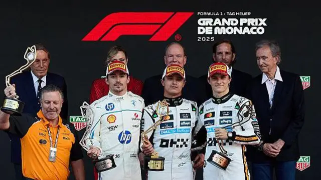 Charles Leclerc, Lando Norris and Oscar Piastri on the podium in Monaco last year