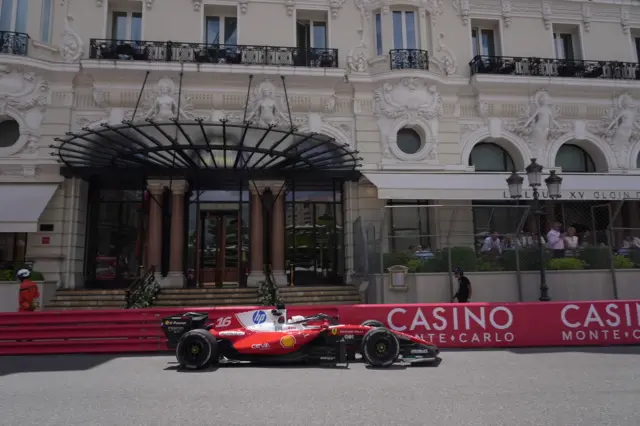 Charles Leclerc drives his Ferrari through Casino Square during Monaco Grand Prix practice