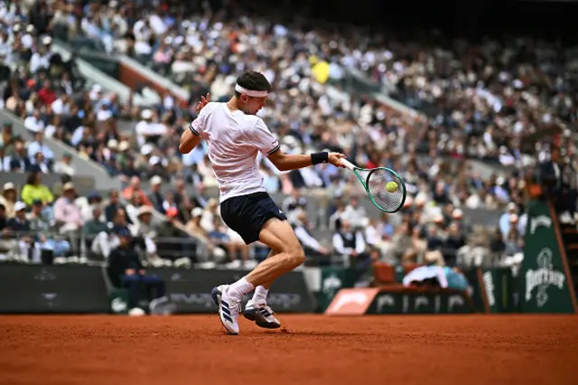Jakub Mensik plays a forehand
