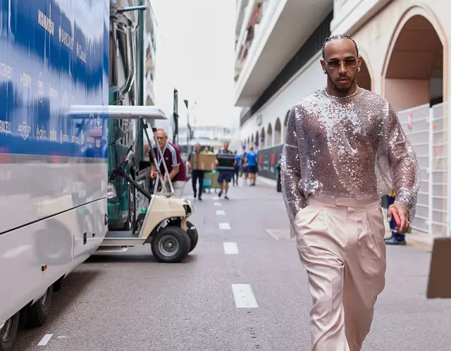 Lewis Hamilton arrives in the Monaco paddock in a glittery top