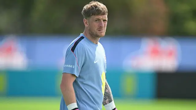 England's goalkeeper Jordan Pickford participates in a training session