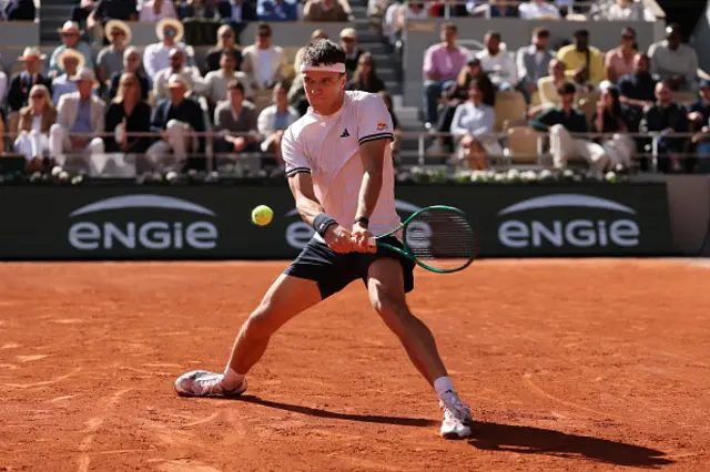 Jakub Mensik of Czechia plays a backhand