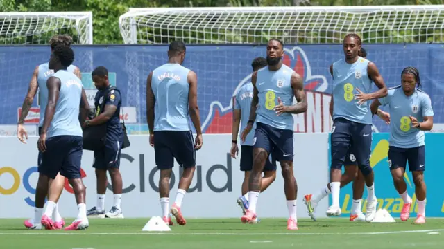 Ivan Toney and Djed Spence of England warm up during a training session