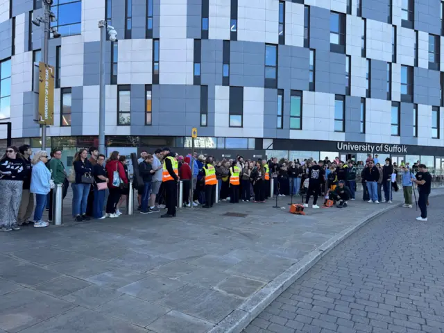 Crowds outside the University of Suffolk building