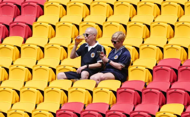 Scotland fan drinking a pint