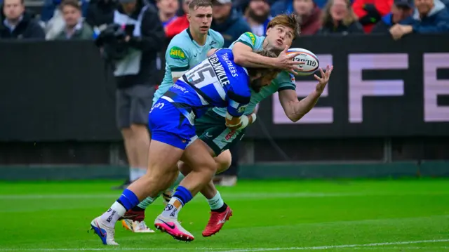Leicester player tackled by Bristol player
