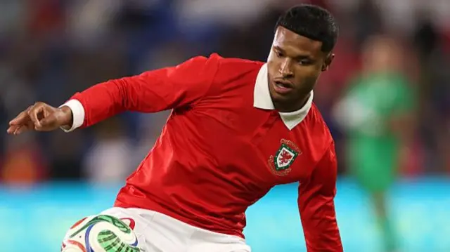 Kai Andrews controls the ball for Wales
