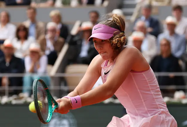 Mirra Andreeva plays a backhand