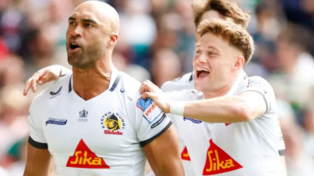 Olly Woodburn and Stephen Varney celebrate a try