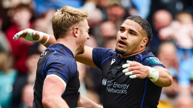 Kyle Steyn and Sione Tuipulotu