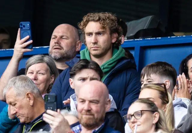 Jamie Ritchie watches on