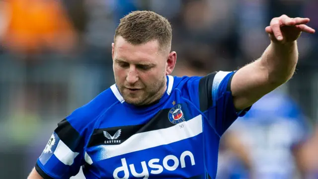 Bath's Finn Russell, in action, kicking for goal.