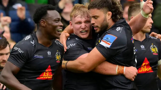 Exeter celebrate scoring try