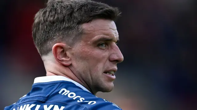 George Ford looks to his right