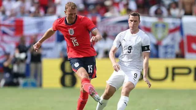 Dan Burn #15 of England is challenged by Chris Wood #9 of New Zealand during the international friendly match between England and New Zealand
