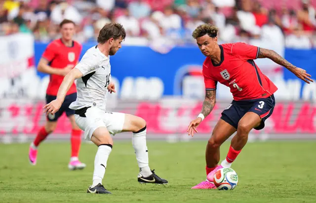 Nico O'Reilly #3 of England is challenged by Alex Rufer #14 of New Zealand during the international friendly match between England and New Zealand