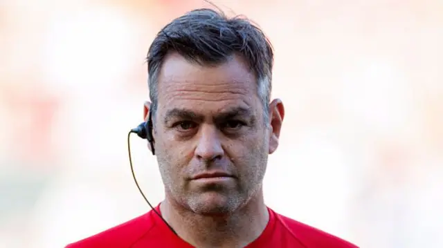Bath head coach Johann van Graan looking towards the camera before a match.