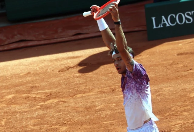 Flavio Cobolli of Italy looks on
