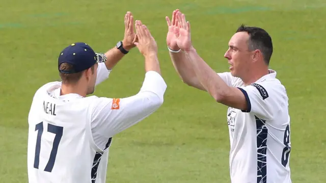 Kyle Abbott celebrates the wicket of Matt Fisher