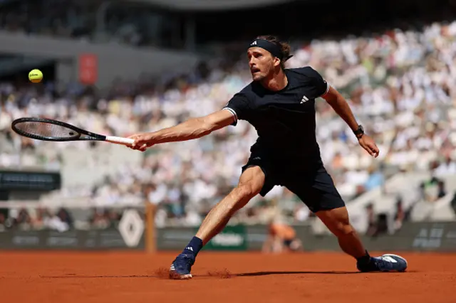 Alexander Zverev of Germany stretches to play a backhand
