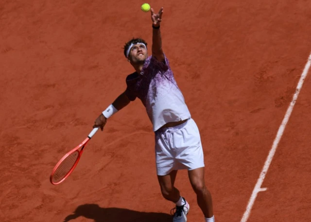 Italy's Flavio Cobolli in action