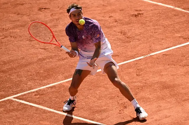 Flavio Cobolli competes