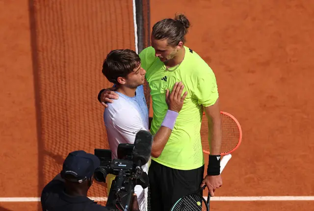 Alexander Zverev of Germany greets Flavio Cobolli of Italy