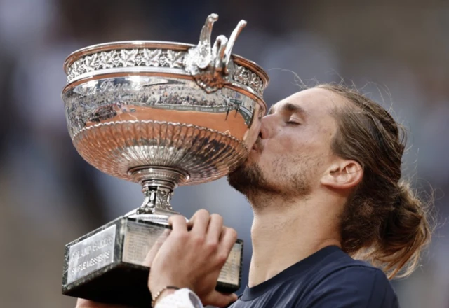 Germany's Alexander Zverev kisses the trophy