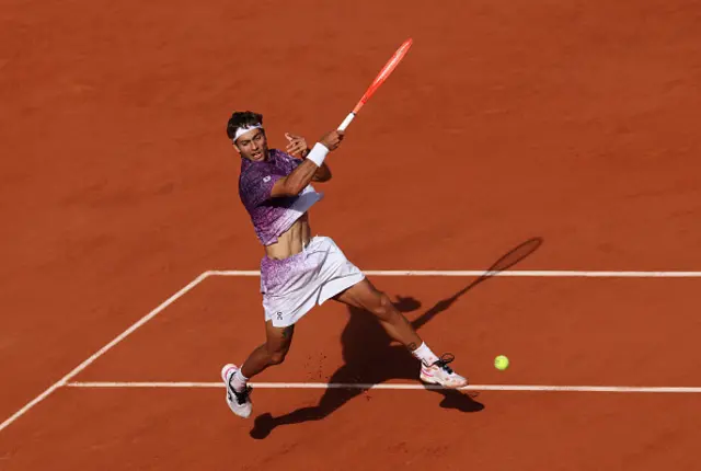 Flavio Cobolli of Italy plays a forehand