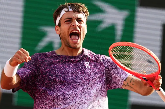 Italy's Flavio Cobolli reacts