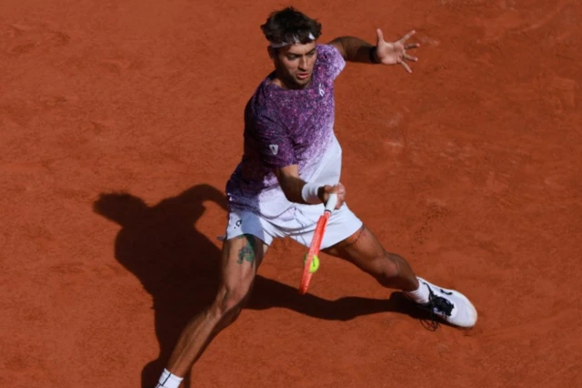Italy's Flavio Cobolli in action
