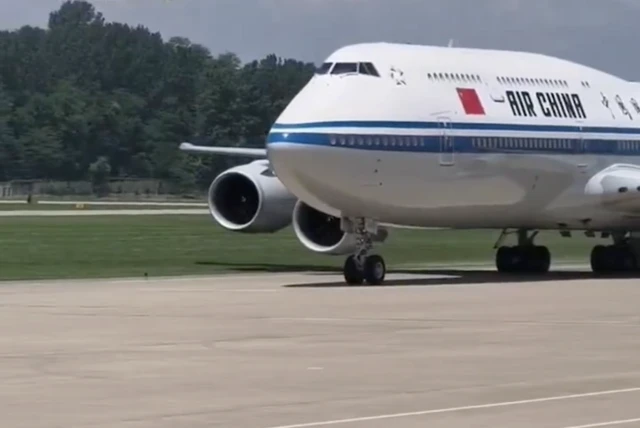 Air China flight arriving in North Korea