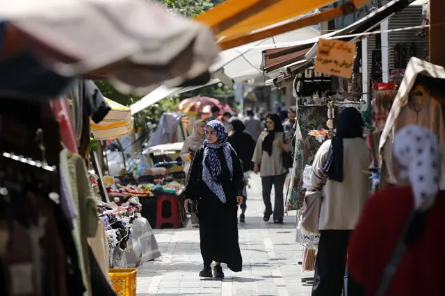 Woman walks down the street