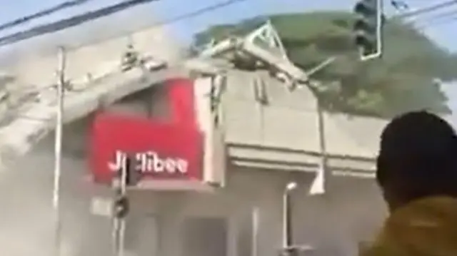 a collapsing Jollibee restaurant