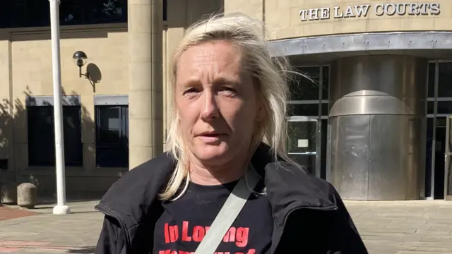 Kelly Lees speaks outside court