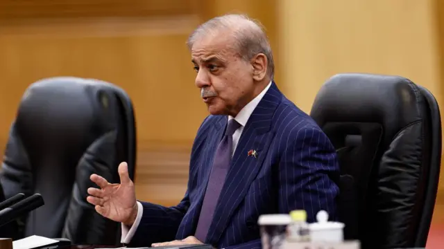 Pakistan PM Shehbaz attending a conference and speaking