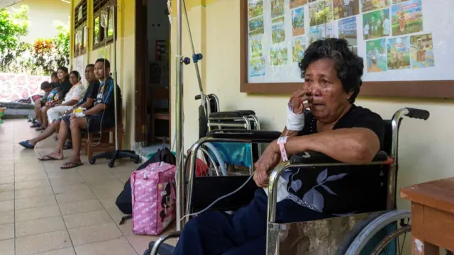 A woman sitting in a wheelchair
