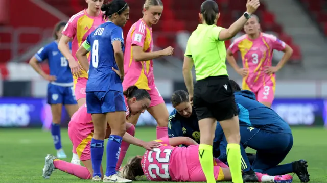 Scotland's Erin Cuthbert lies injured against Israel
