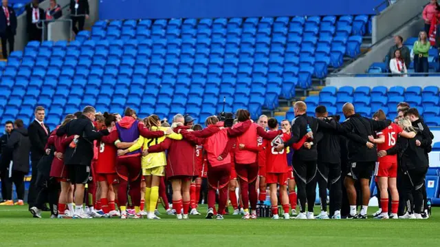 Wales players in a huddle